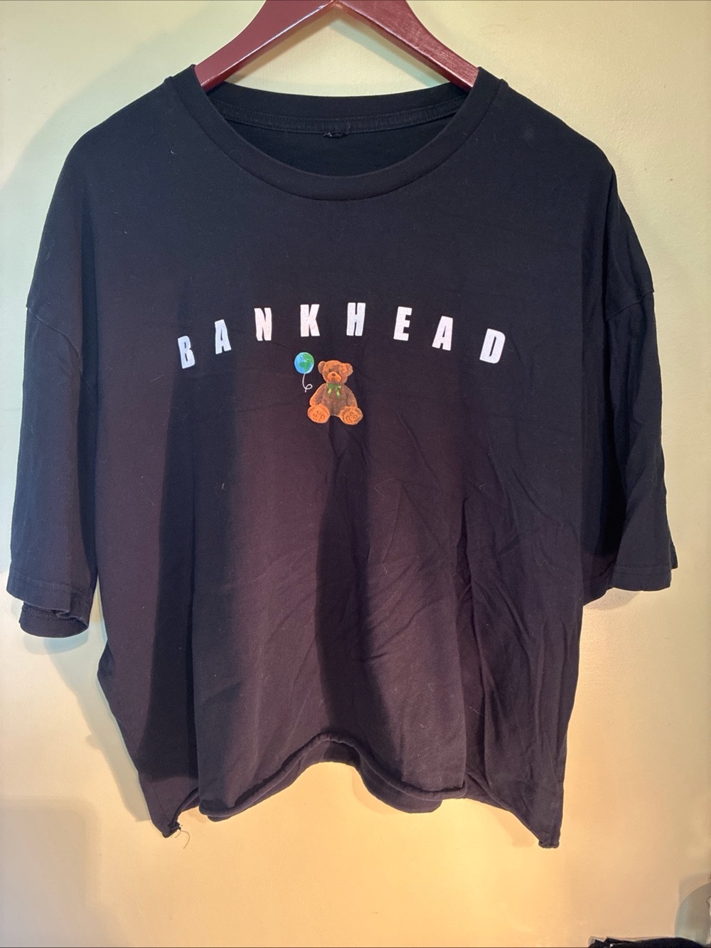 Black Teddy Graphic Tee size 2XL based on measurement’s. Cut/cropped